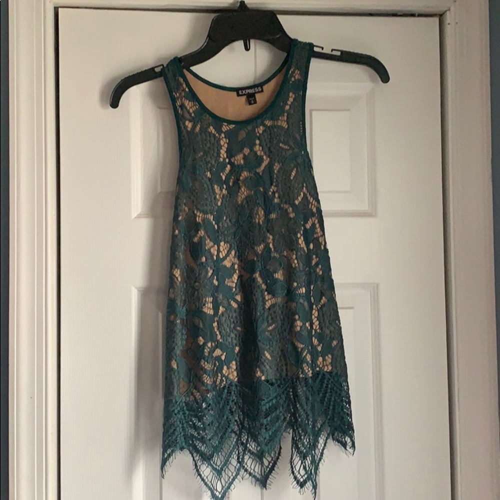 Tank top with lace and nude under layer